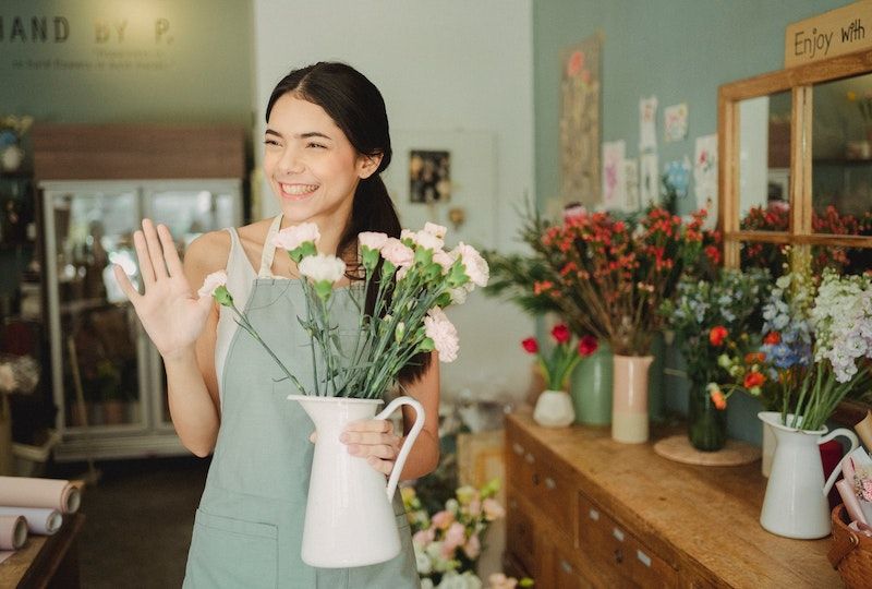 Florist Waving and Smiling Florist Greeting