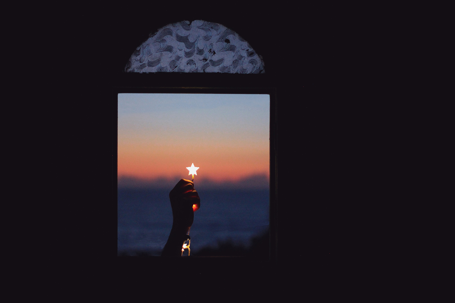 Star in a Window Held by a Hand Star in a Window Held By a Hand